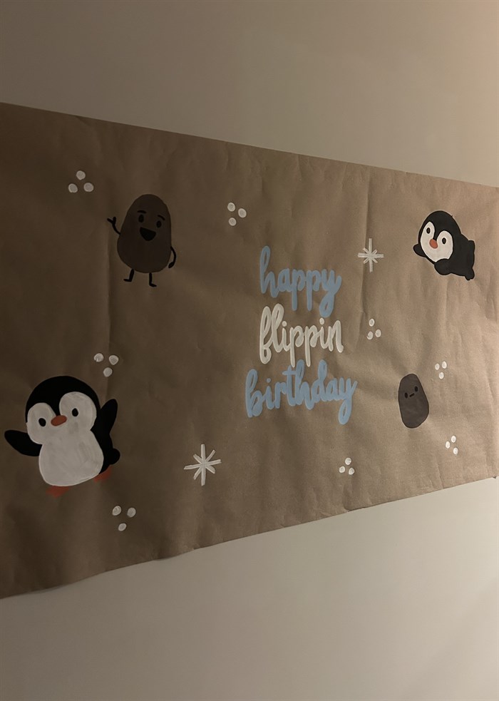 'Happy flippin birthday' penguin banner
